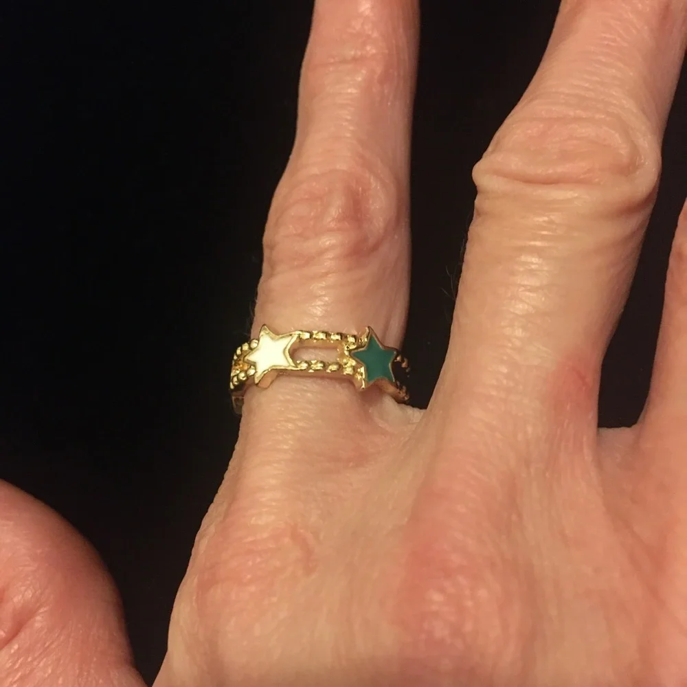 Gold Tone Star Ring with Green and White Accents